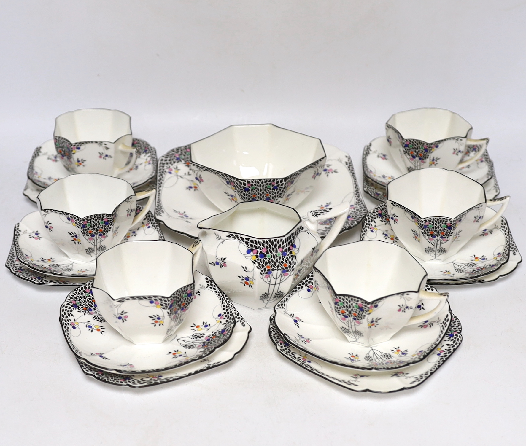 A Shelley Black Leafy Tree pattern part tea set comprising trios, milk jug, bowl and sandwich plate